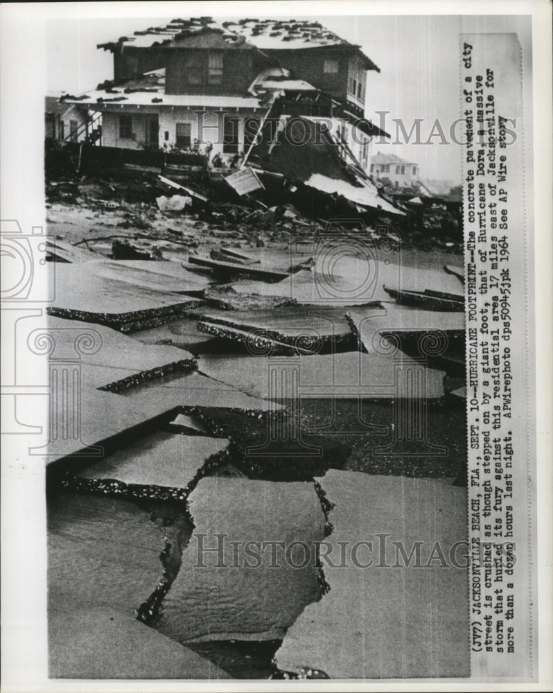 1964 Hurricane Dora- Concrete pavement of street crushed. - Historic Images