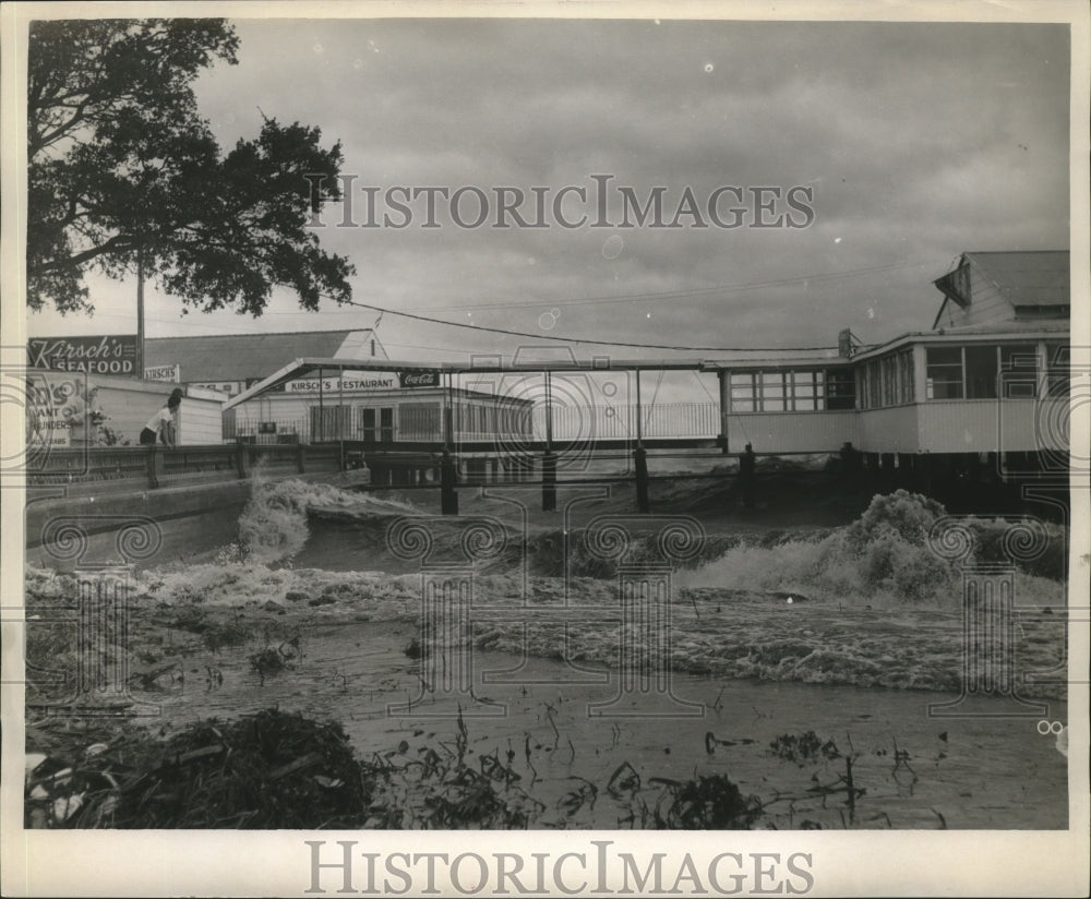 1964 Hurricane Hilda- High waves on shore line restaurants - Historic Images