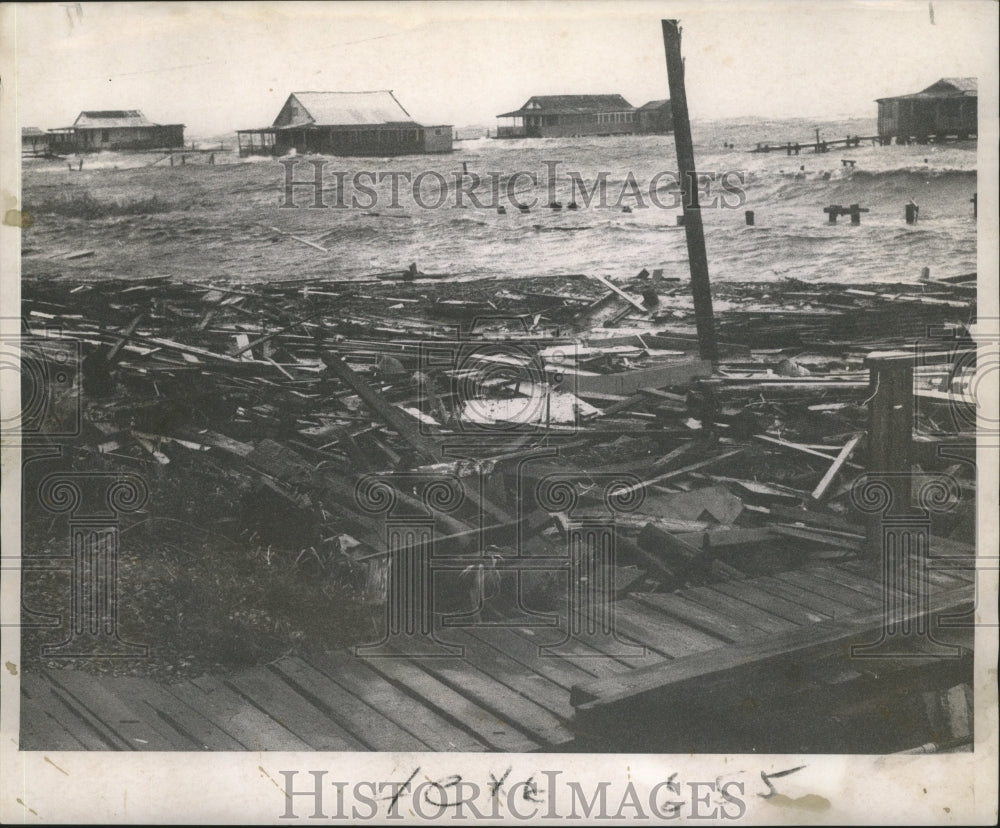 1964 Hurricane Hilda- Hayne Blvd. camps battered by waves. - Historic Images