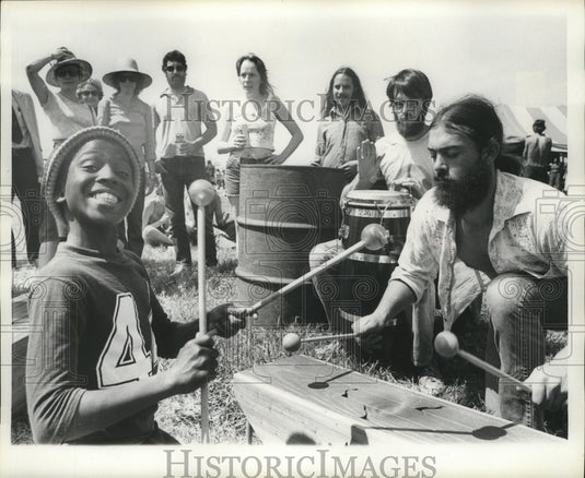 1976 Press Photo New Orleans Jazz & Heritage Festival, Boy Plays Wood Instrument - Historic Images