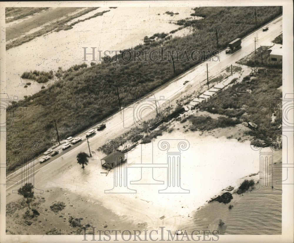 1961 Hurricane Carla- Hwy 90 past junction of 11 going east flooded. - Historic Images