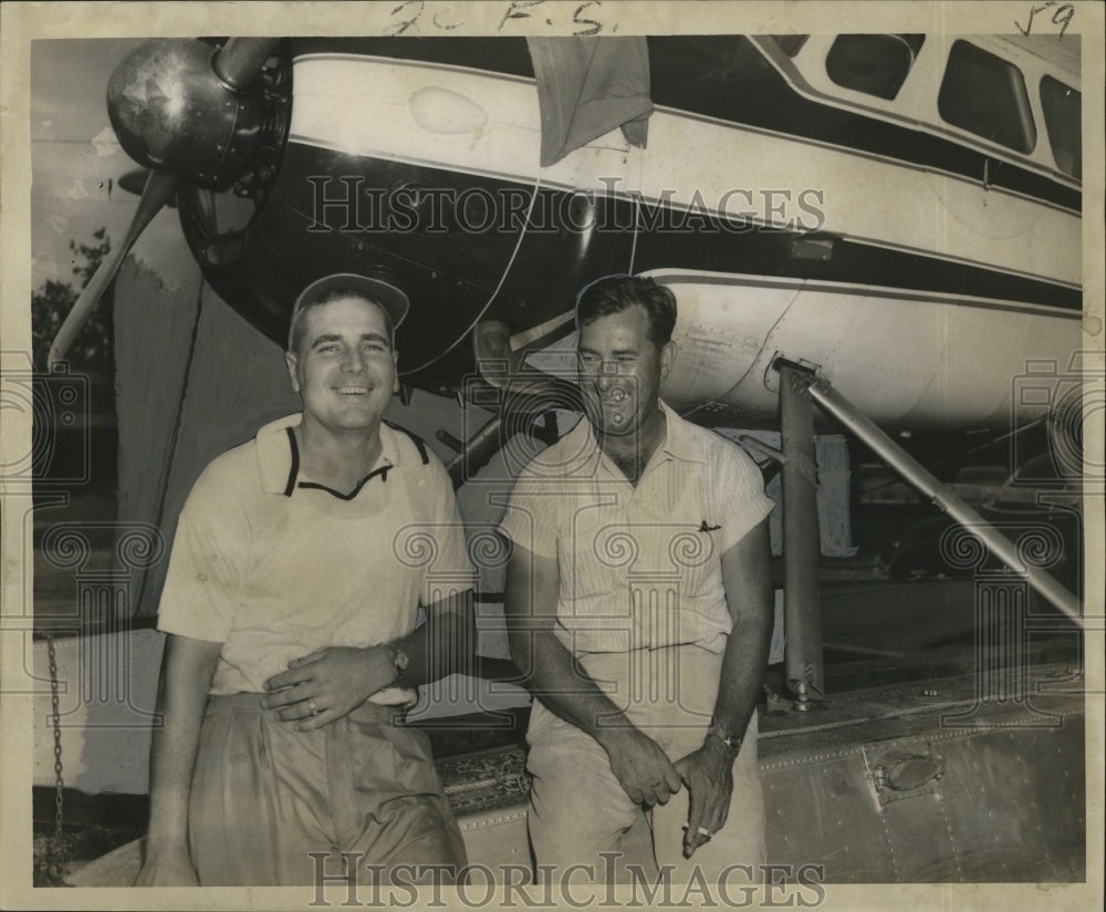 1957 Hurricane Audrey- Seaplane pilots Des Hare and Errol Cloutier. - Historic Images