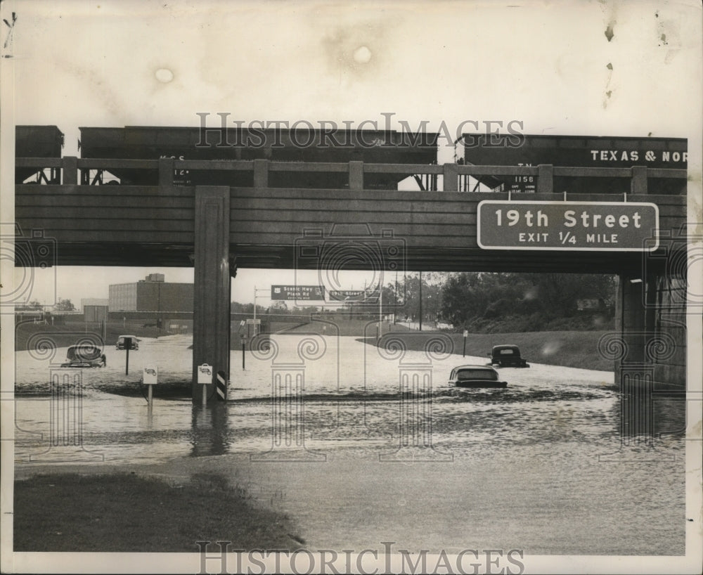 1964 Hurricane Hilda-Four cars stranded in underpass in flash flood - Historic Images