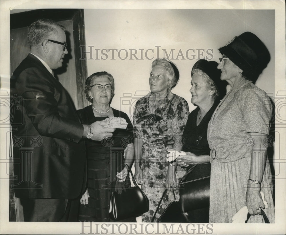 1965  Hurricane Betsy- Fundraiser tickets being sold at St. Charles - Historic Images