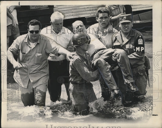 1965 Hurricane Betsy, Soldiers and Other Rescue Workers Carry Man - Historic Images