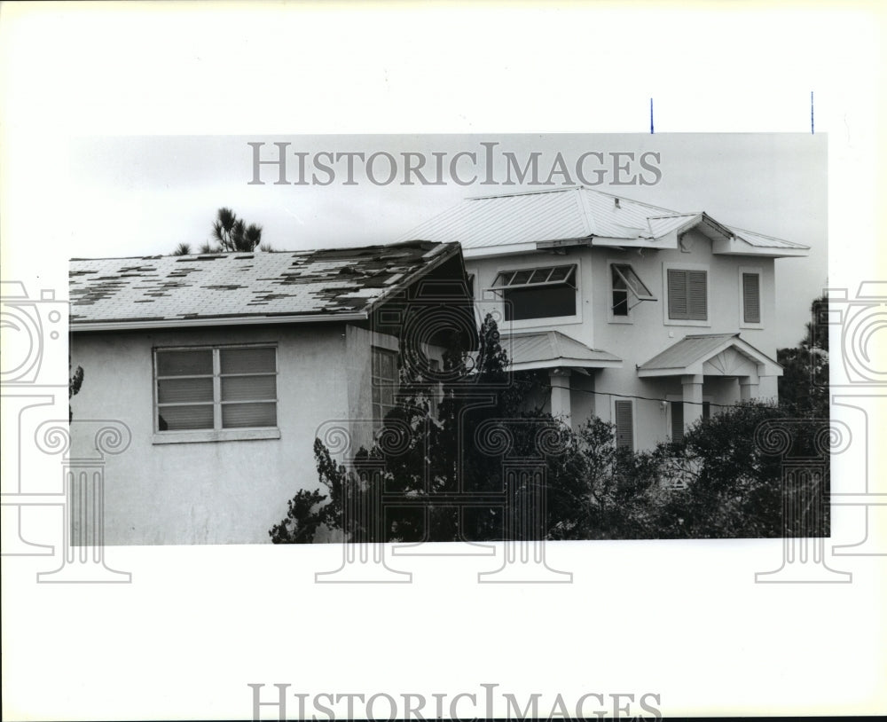 1995 Hurricanes- Metal Hurricane shutter protects home&#39;s &quot;envelope.&quot; - Historic Images