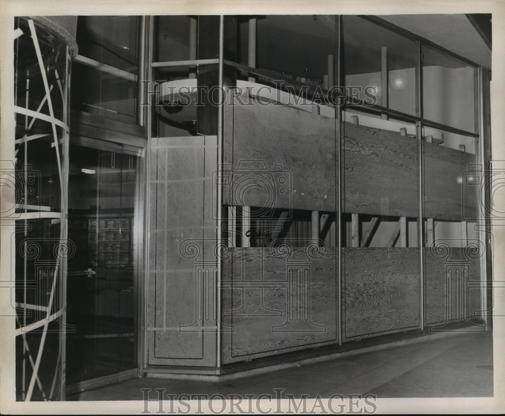 1960 Hurricane Ethel- Store windows boarded up for storm. - Historic Images