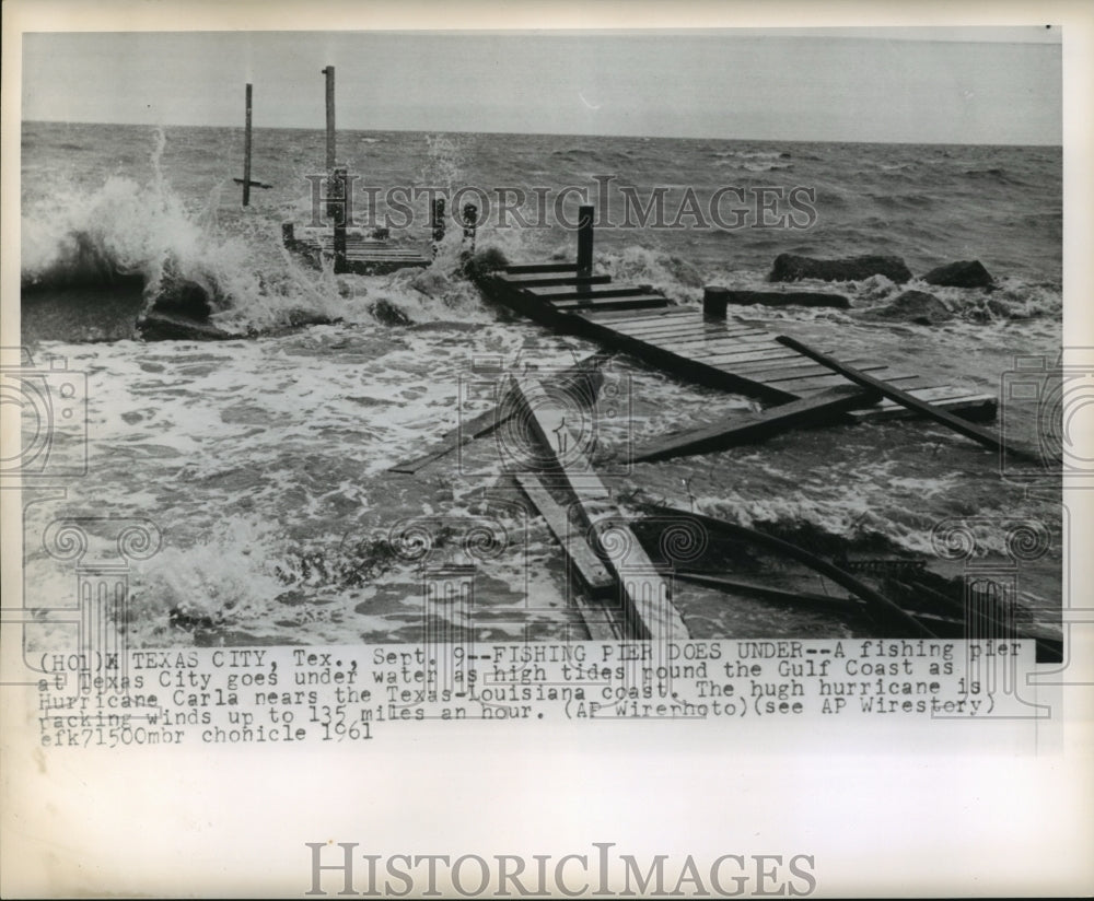 1961 Hurricane Carla- Fishing pier at Texas City goes under. - Historic Images