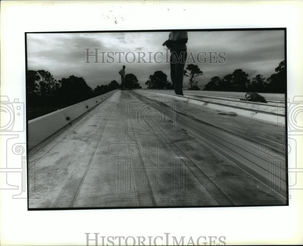 1995 Hurricane Opal- Damaged roof on Smith Antique Shop, near Destin - Historic Images