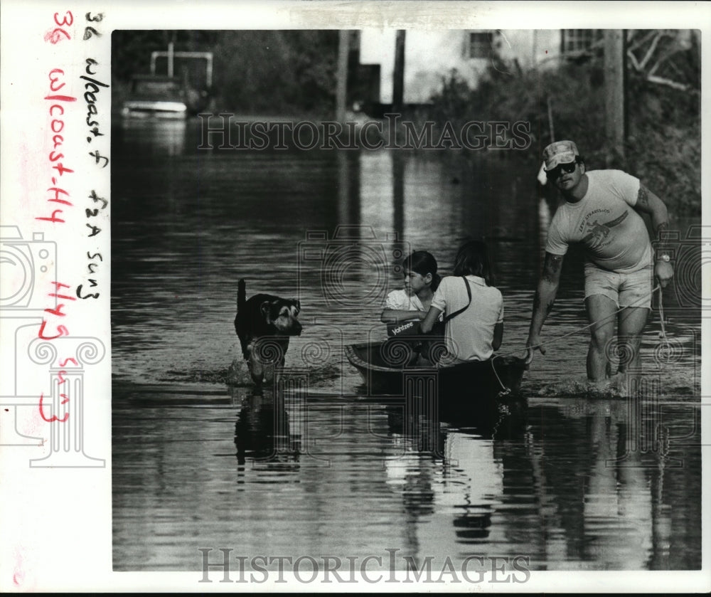 1985 Hurricane Juan-Getting through rising water in Lafitte. - Historic Images