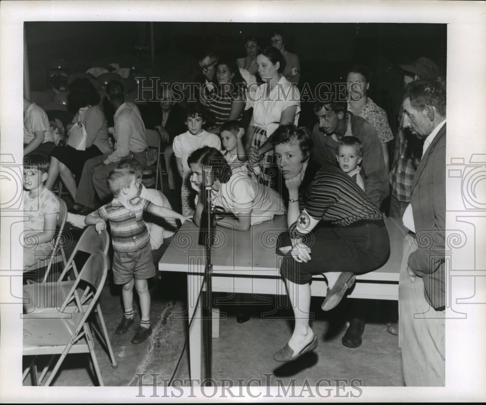 1956 Hurricane Flossy- Refugees from hurricane at relief center. - Historic Images