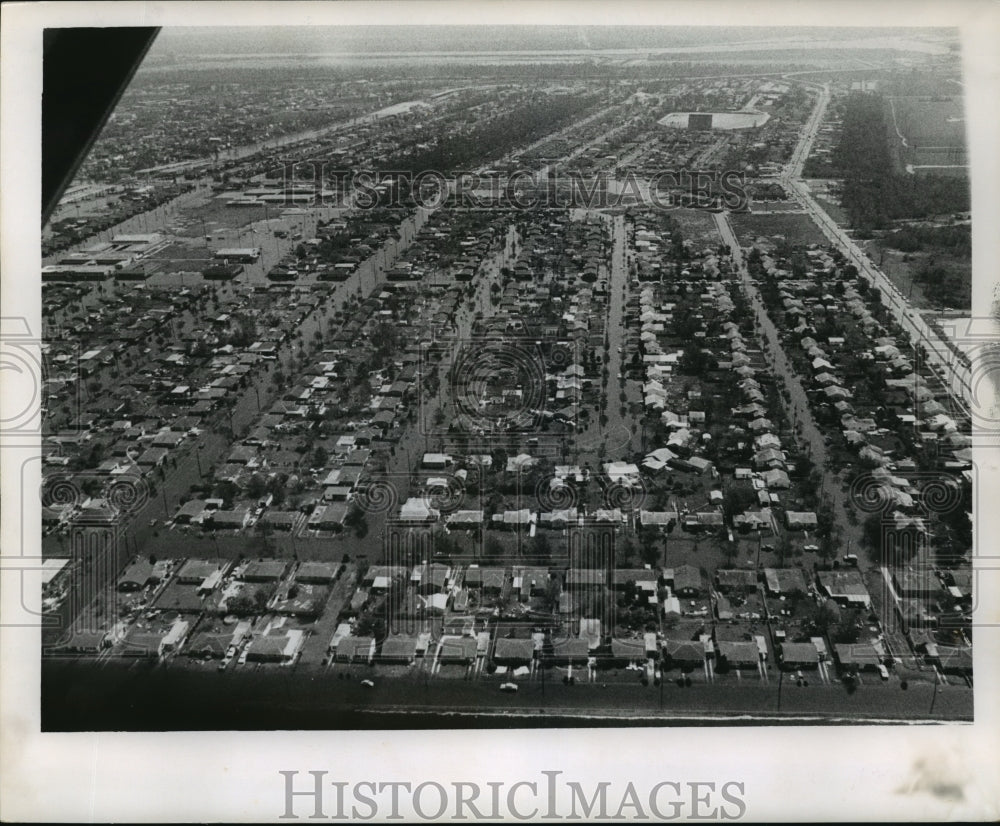 1965 Hurricane Betsy- Aerial view of flooding at Pines Village. - Historic Images