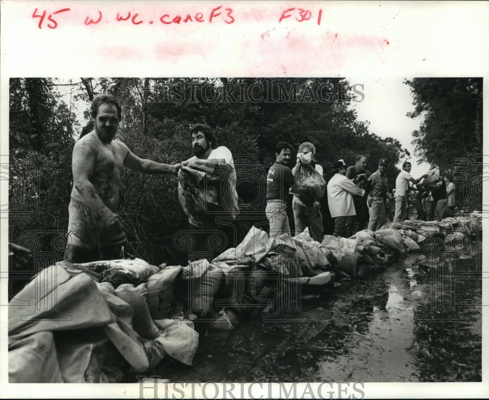 1985 Hurricane Juan - Residents Contain Lake Salvador with Sand Bags - Historic Images