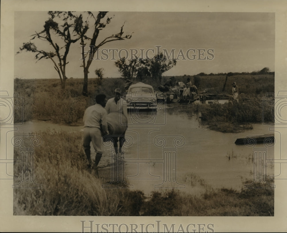 1965 Hurricane Flossy- Picking up the pieces. - Historic Images