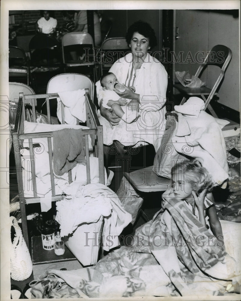 1960 Hurricane Ethel- Family in shelter at Chalmette High School. - Historic Images