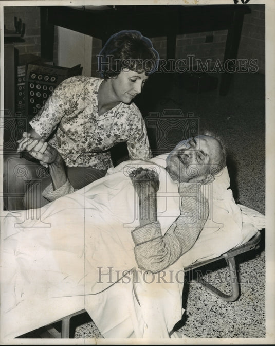 1964 Hurricane Hilda- Volunteer from Plaquemines Parish & patient. - Historic Images