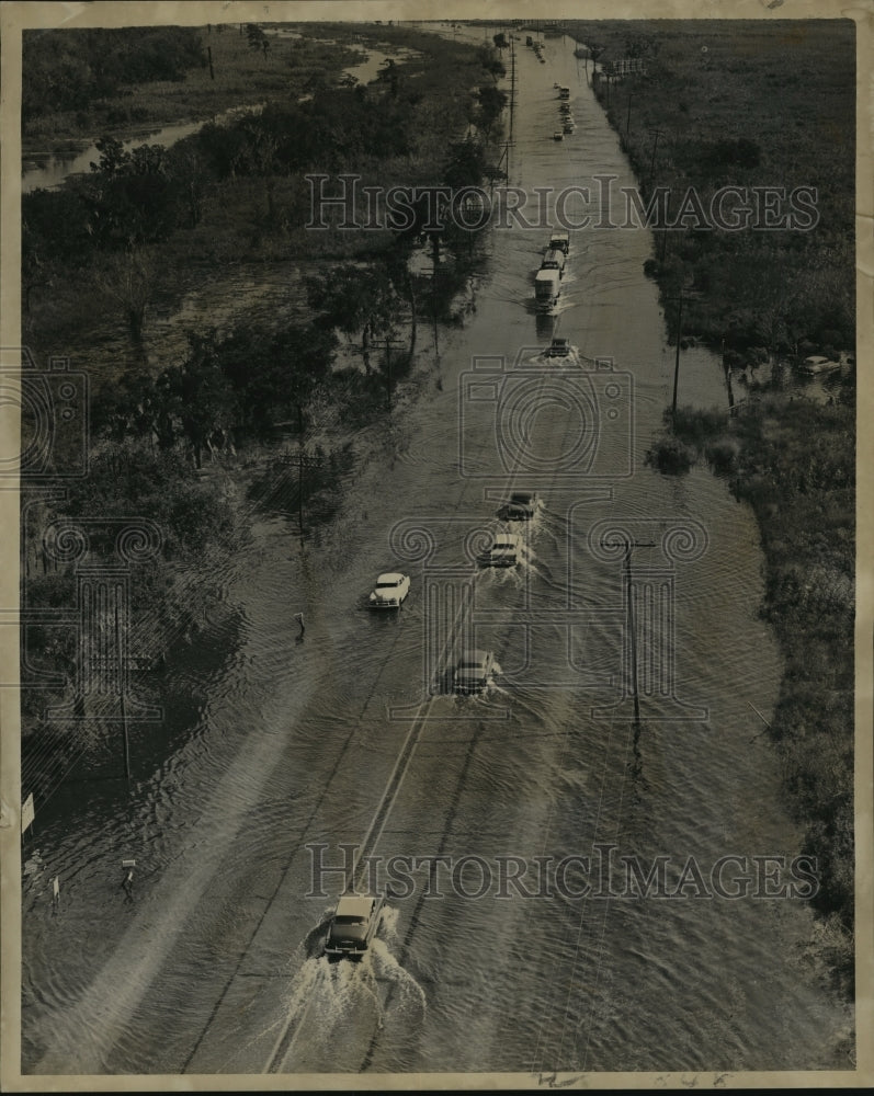 1956 Hurricane Flossy- Water covers Chef Menteur Highway. - Historic Images