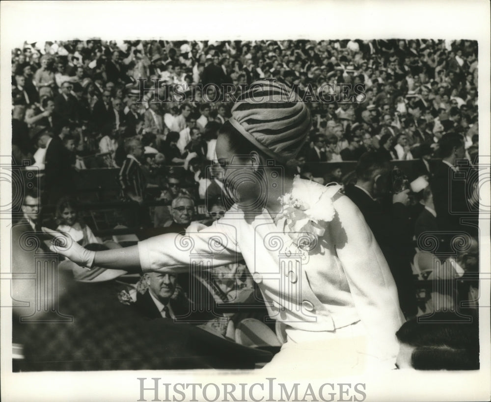 1965 Press Photo Sugar Bowl - Young Woman Waves During Halftime Festivities-Historic Images