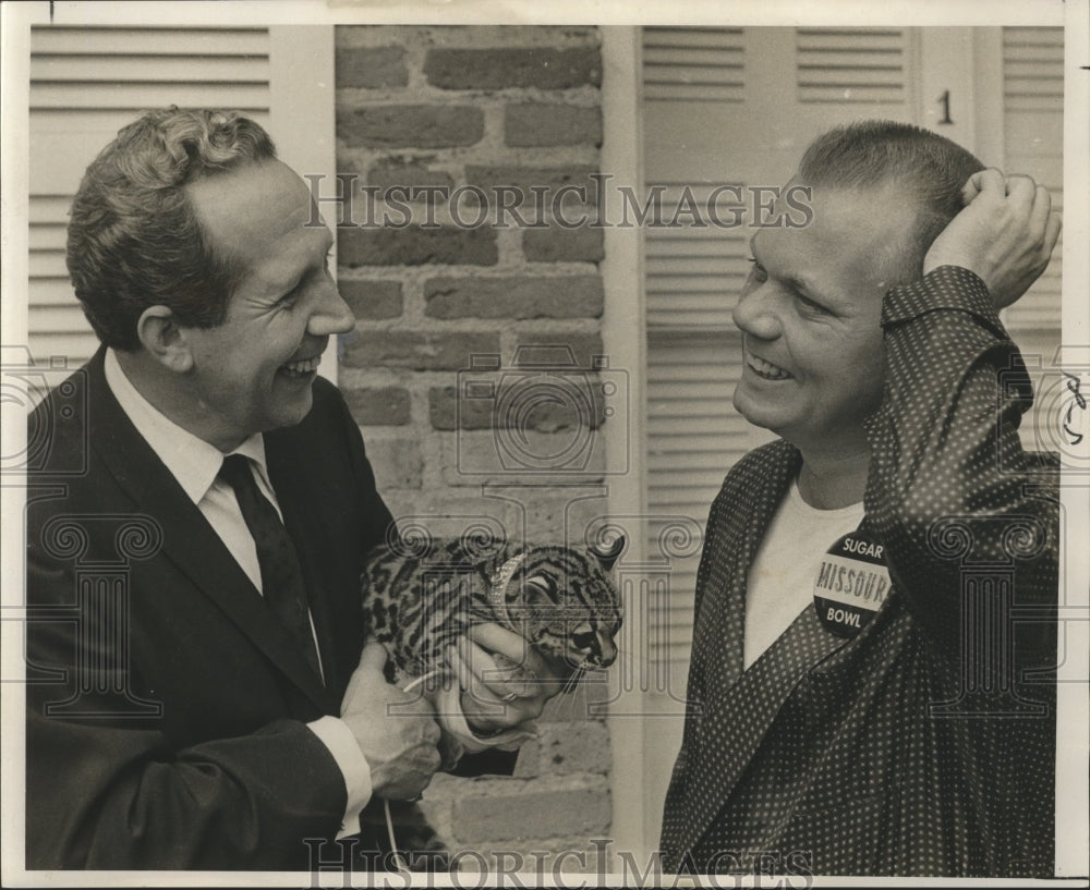 1966 Sugar Bowl-A.T. Gustin III of Kansas City Mo. receives tiger. - Historic Images