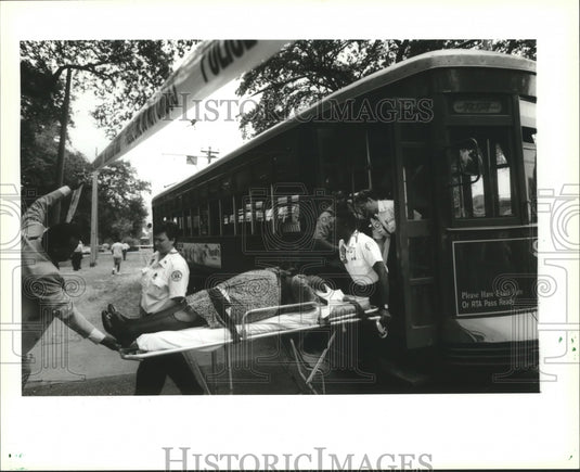 1995 New Orleans Streetcar Accidents- Woman removed from streetcar.-Historic Images