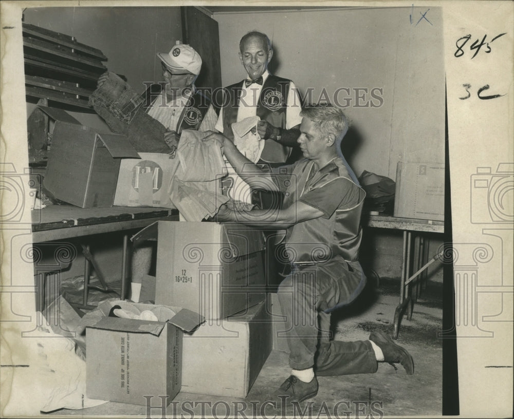 1969 Press Photo Hurricane Camille - B. Hunt, C. Mull &amp; P. Maurer Pack Donations - Historic Images