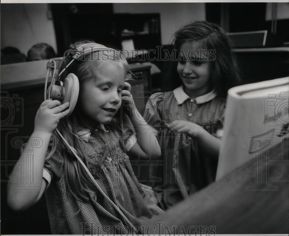 1973 Press Photo Second grader practicing piano with headphones - noa06091 - Historic Images