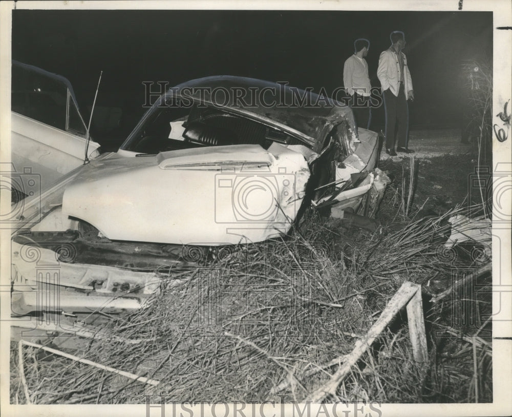 1967 Automobile accident on Highway 11 near Highway 90 junction - Historic Images