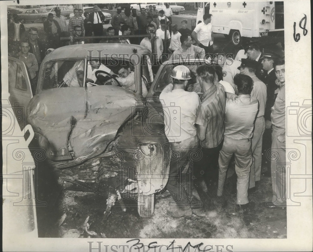 1967 Accidents-Attempting to extricate Harry Cambre, from truck.-Historic Images