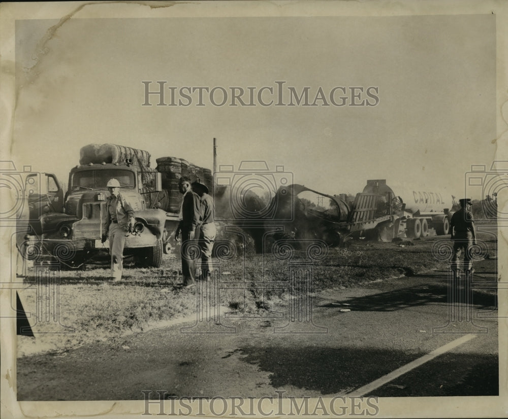 1960 Automobile accident with workers on the scene - Historic Images