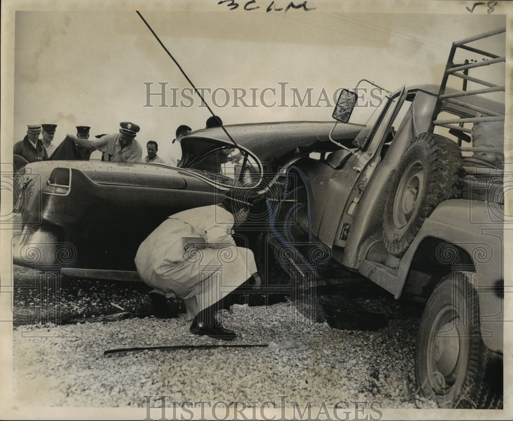 1966 Accidents- Watching removal of a pickup from side of car. - Historic Images