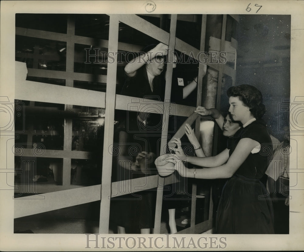 1950 Mary Edwards and Mary Dedinger, Lord&#39;s employees, tape windows. - Historic Images