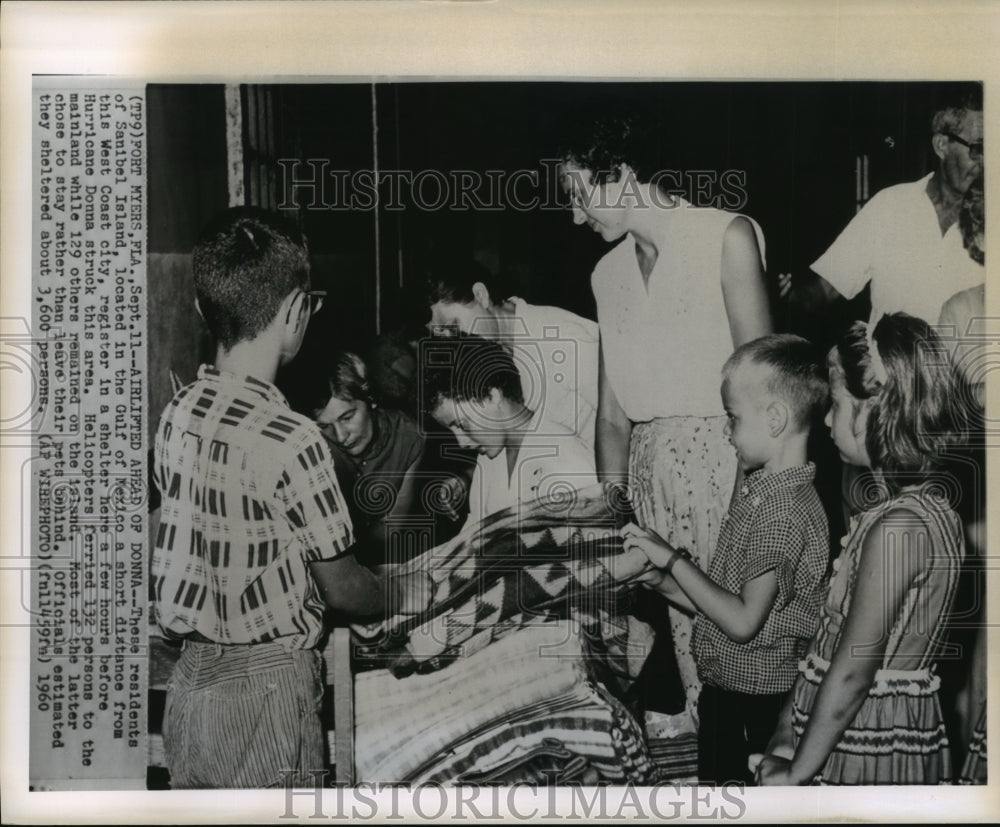 1960 Hurricane Donna-Residents of Sanibal Island register in shelter - Historic Images