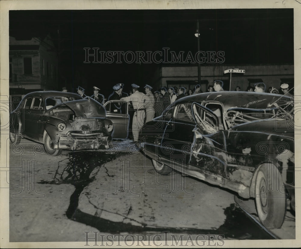 1957 Accidents- Police gather details at scene of fatality accident. - Historic Images