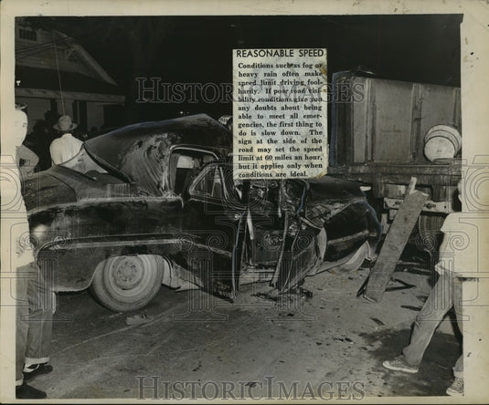 1956 Accidents-Badly damaged auto rests behind truck it crashed into - Historic Images
