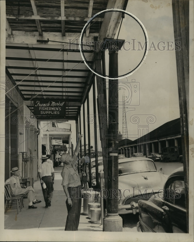 1957 Lower Pontalba apartments unsafe balcony shown by James Cook - Historic Images