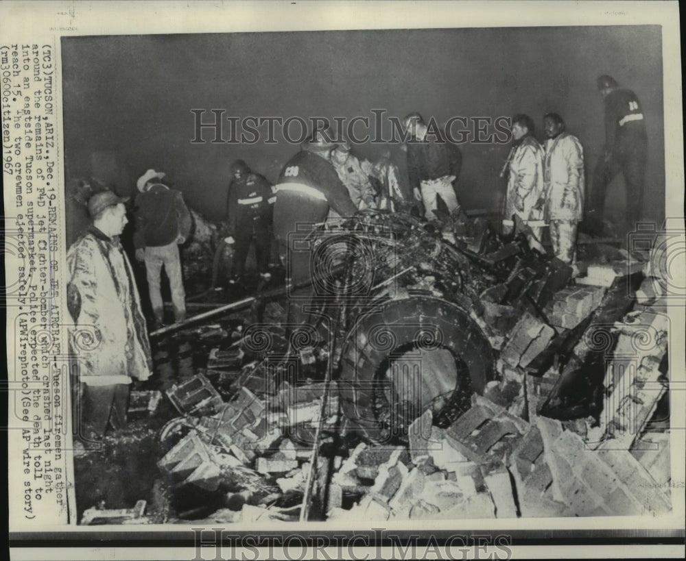 1967 Accidents - Tucson firemen around F4D jet fighter-bomber crash. - Historic Images