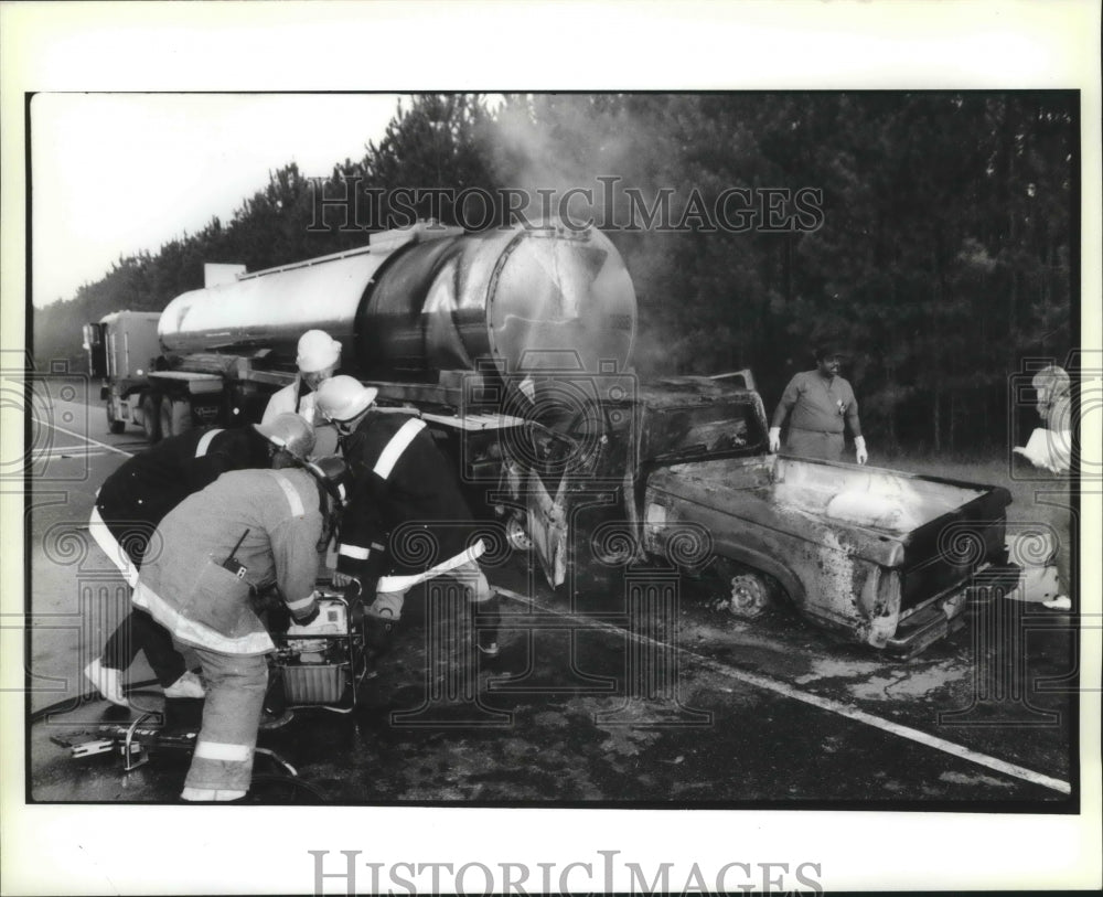 1990 Accident- Small truck rear ends tanker truck and burns. - Historic Images