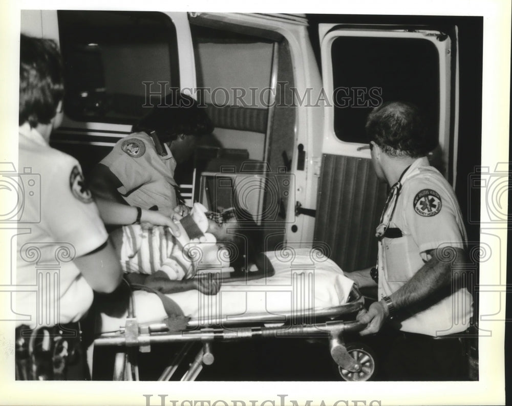 1988 New Orleans - Injured Child is Treated from Train &amp; Car Wreck - Historic Images