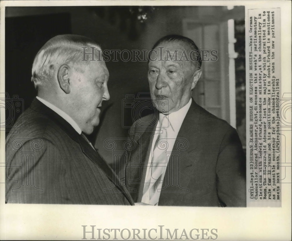 1961 German Leaders Adenauer &amp; Erhard huddle on election results - Historic Images