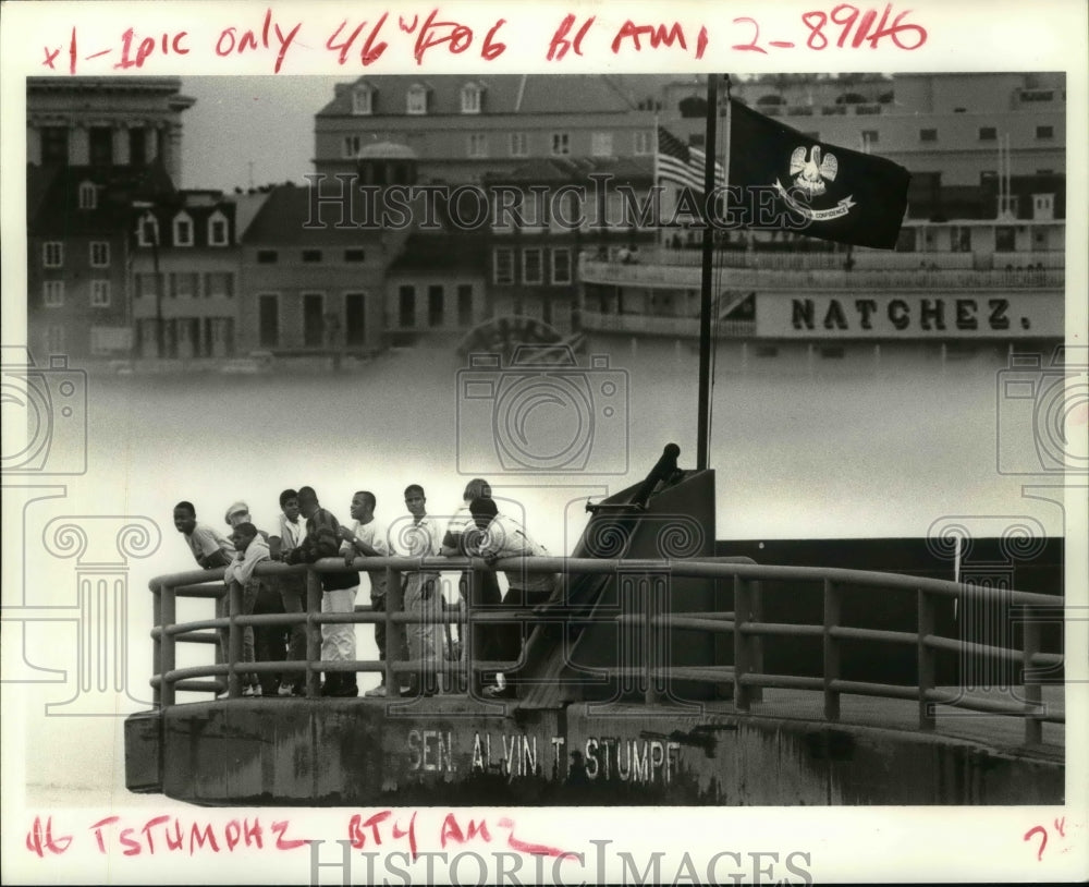 1988 Passengers on Algiers Ferry stand at bow as fog hovers on river - Historic Images