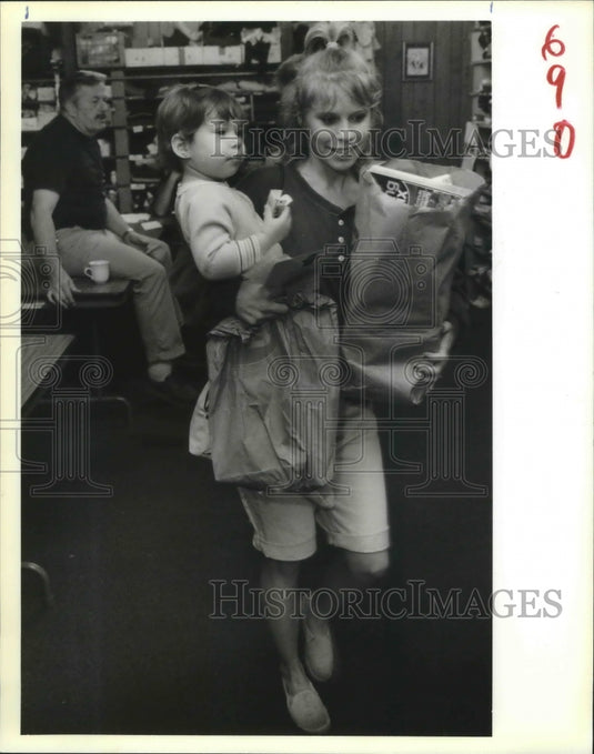 1988 Stephanie Achee & Son Kevin Leave Food Bank with Groceries - Historic Images
