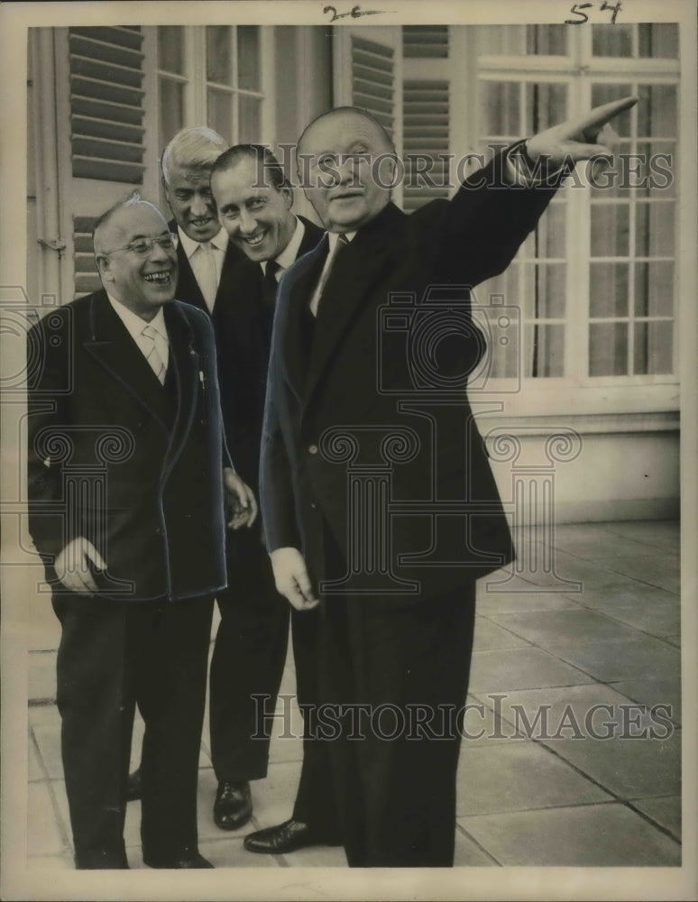 1959 West German Chancellor Konrad Adeneur with 3 unidentified men. - Historic Images