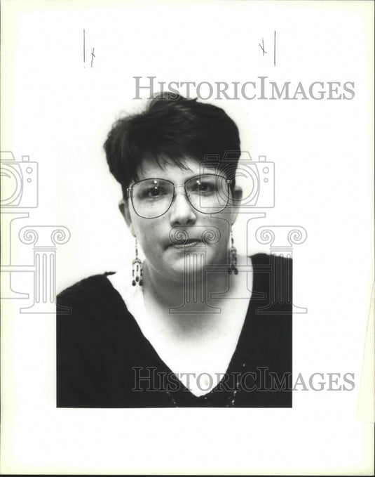 1994 Leslie Adams, volunteer with agenda for children's project. - Historic Images