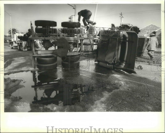 1991 Accidents- Driver of tractor trailer and sedan were injured. - Historic Images