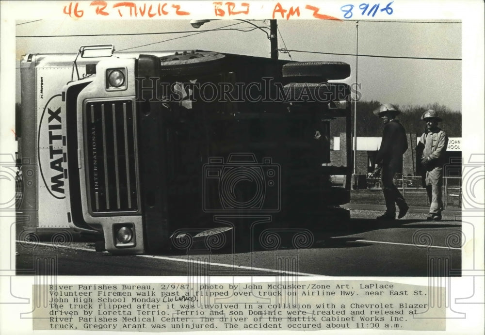 1987 New Orleans - Firemen Check Flipped Truck on Airline Highway - Historic Images