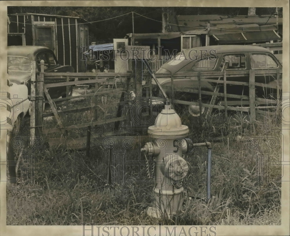 1966 This home is one of many illegally connected by fire hydrants. - Historic Images