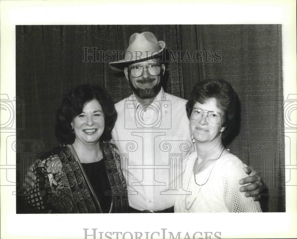 Patricia Brady, Bill Albert and Susan Albert, mystery novelist. - Historic Images