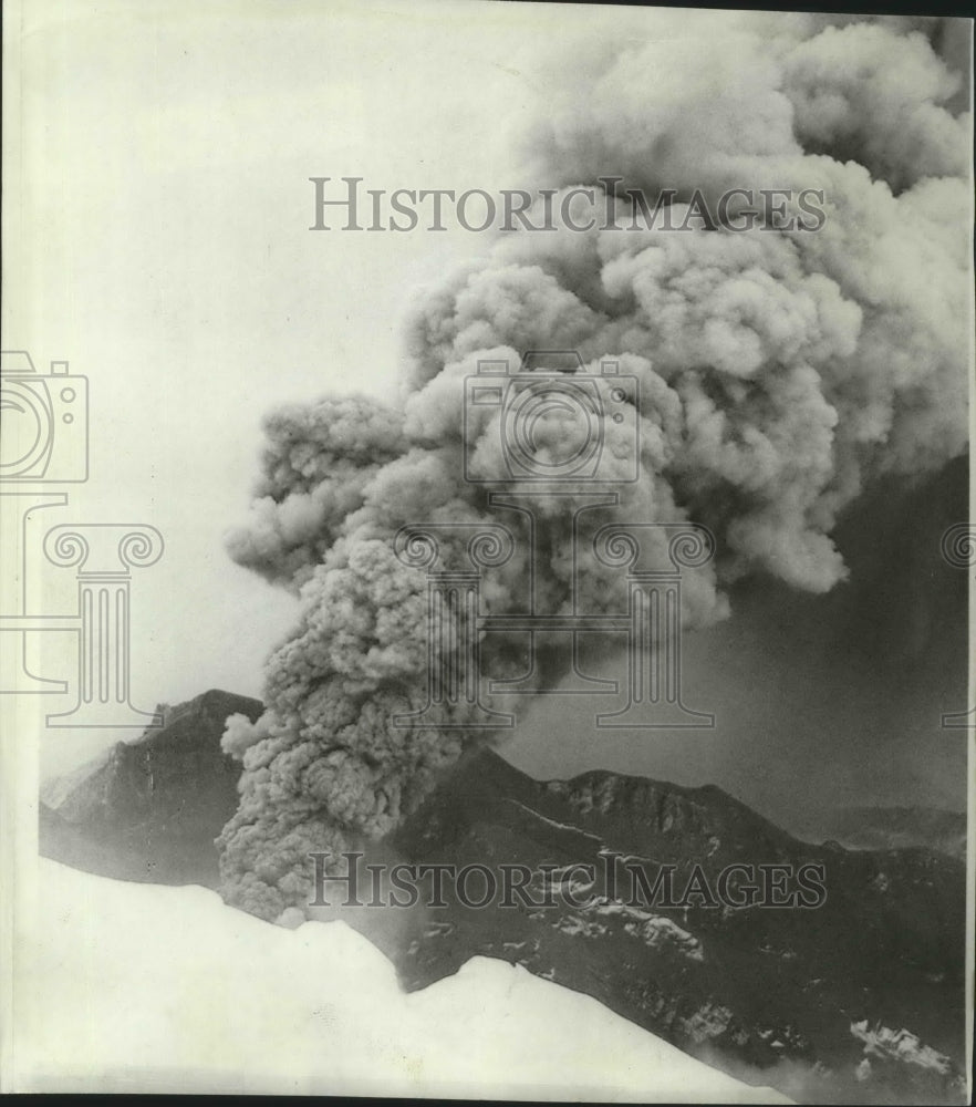 1966 Smoke billows from near the crest of Mt. Redoubt in Alaska. - Historic Images