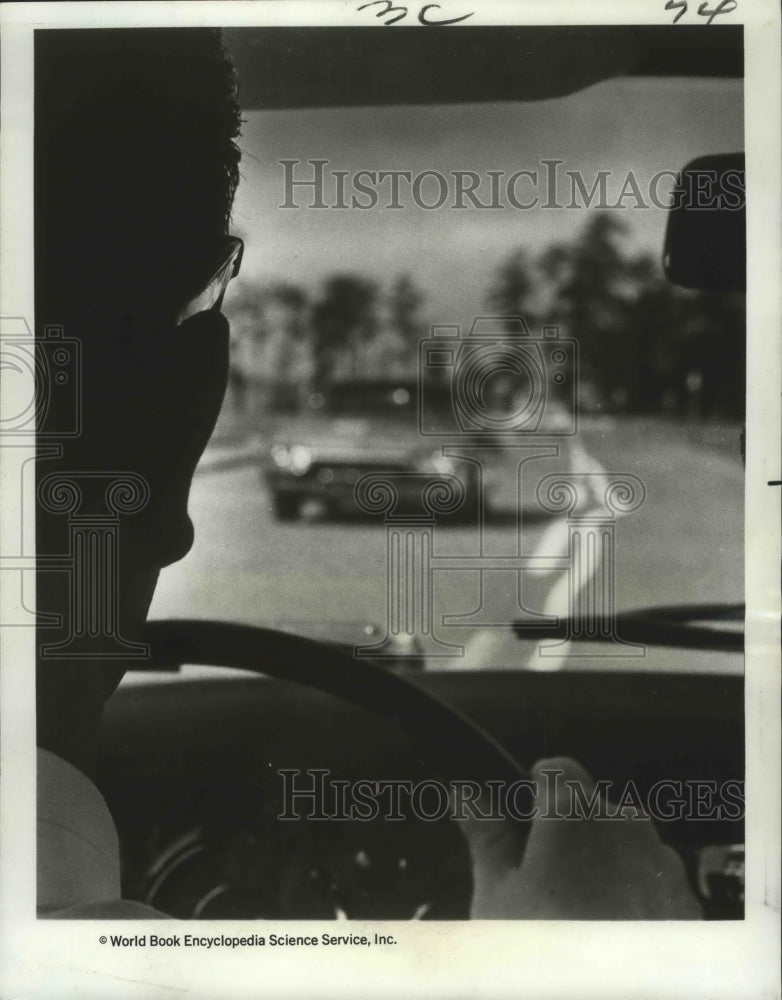 1966 View through windshield of a drunk driver. - Historic Images