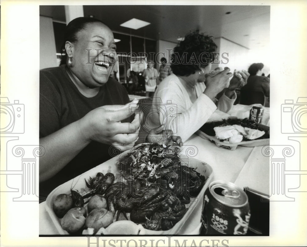 Christel Montgomery and fired chowing down on crawfish. - Historic Images